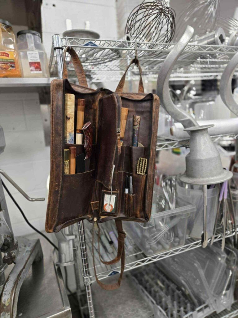 Drumstick Knife Bag hanging in professional kitchen